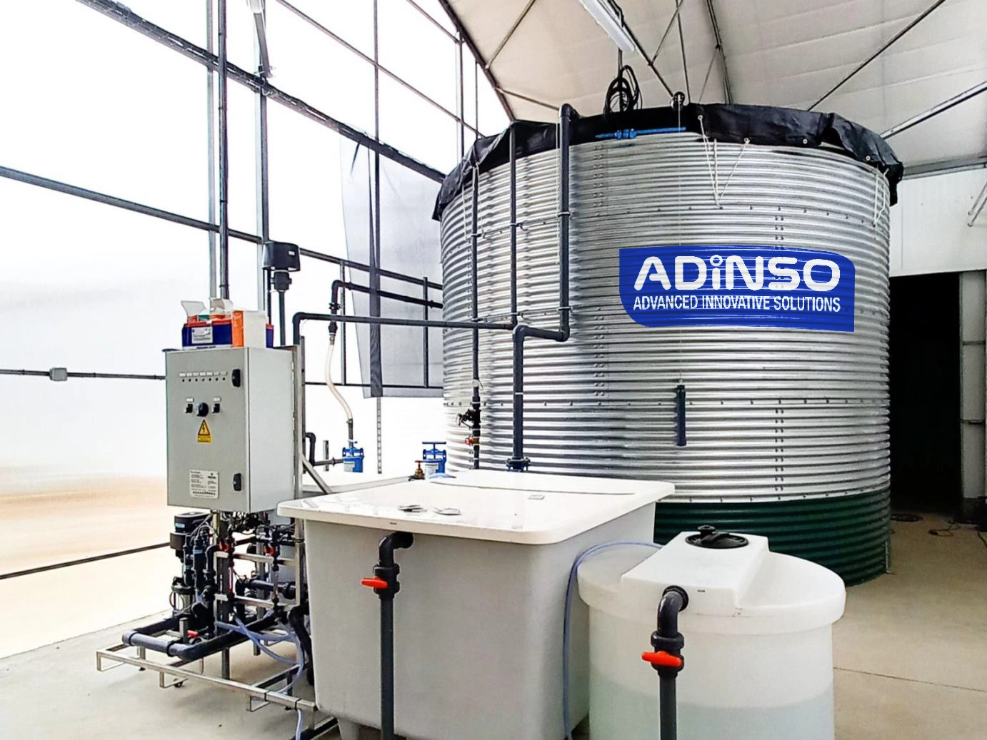 ADiNSO branded modular corrugated galvanized water silo installation