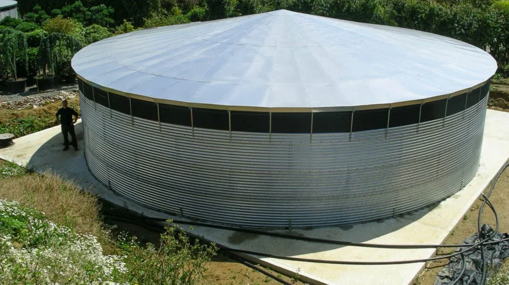 NPI galvanised steel silo roof panels with inspection hatches installed on water tank